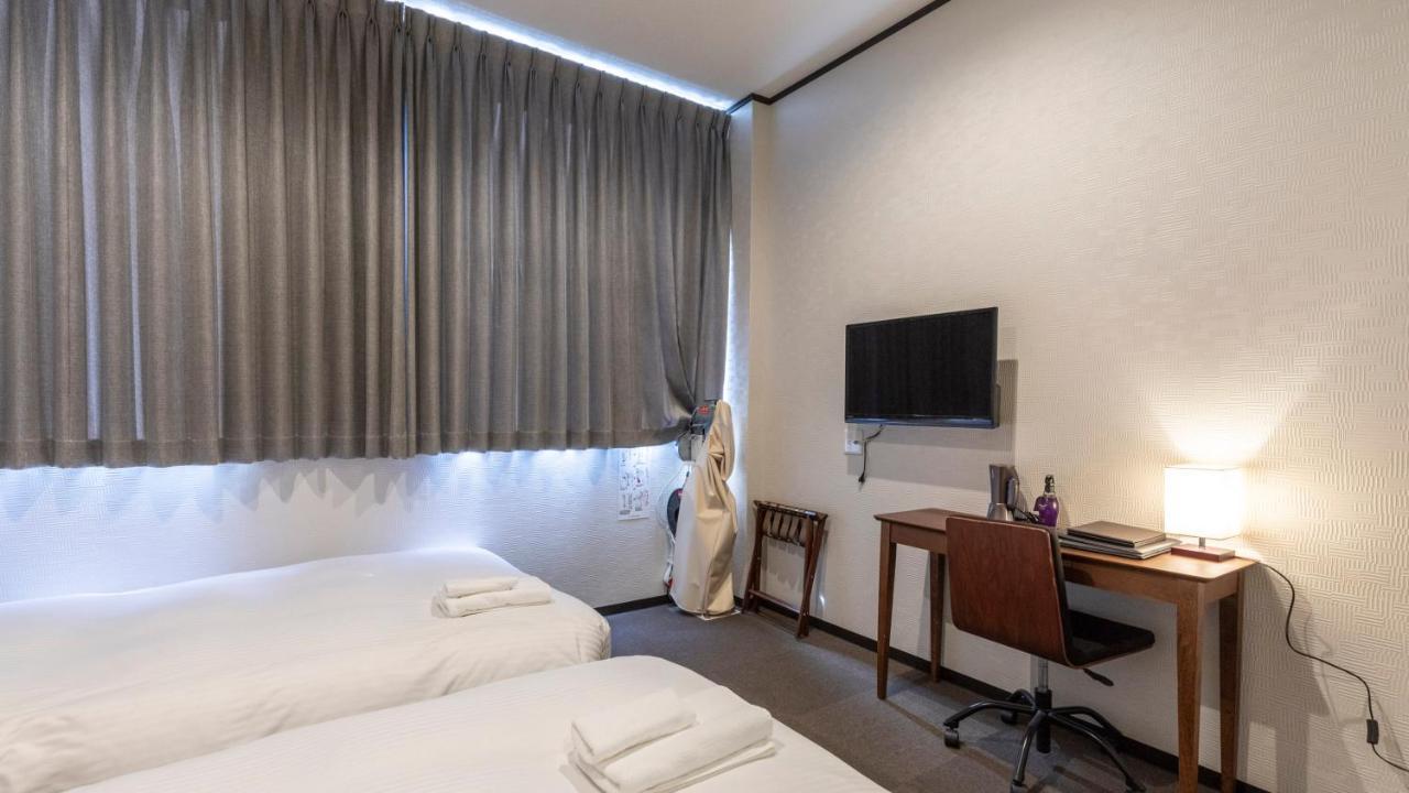 Tabist Osaka Port Hotel L'Espoir Esterno foto